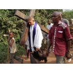 The priest carrying his cross.JPG